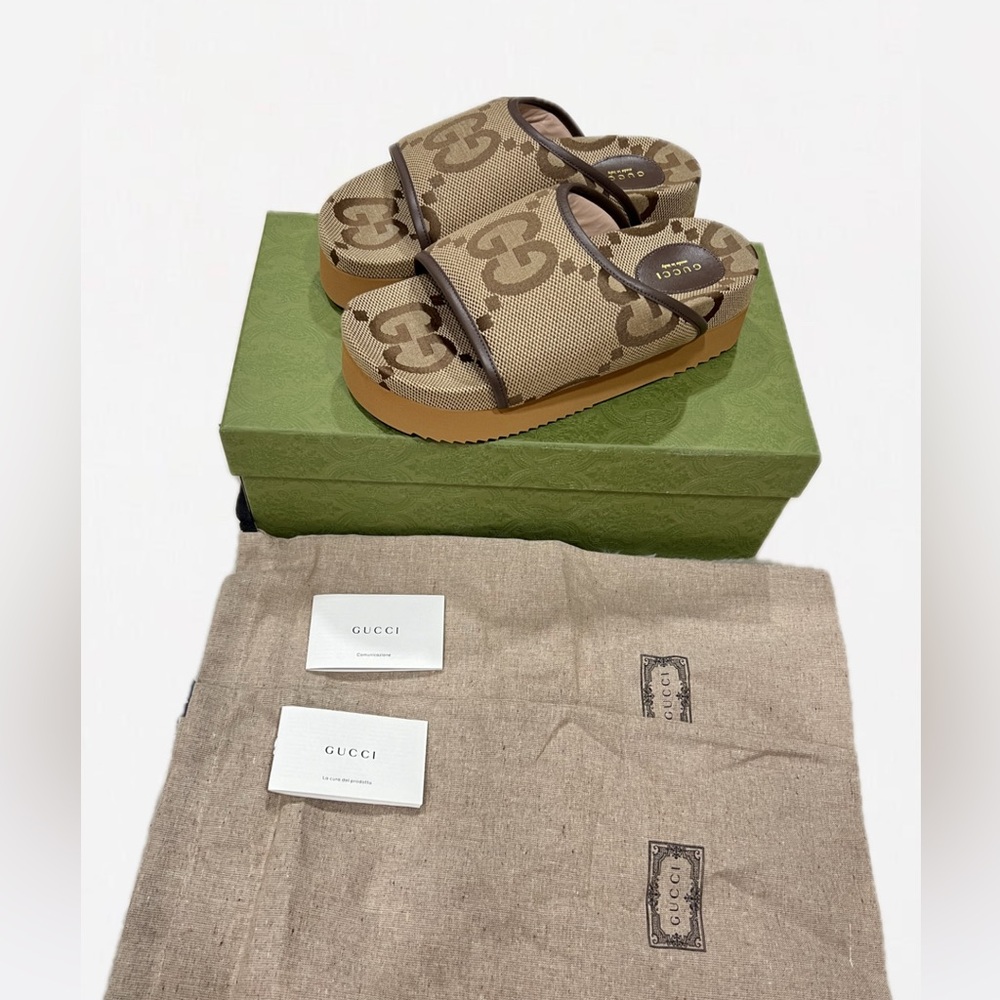 GUCCI || Angelina GG Canvas Flatform Slide Sandals
(NWT)
Slide Sandals  GG Us 10